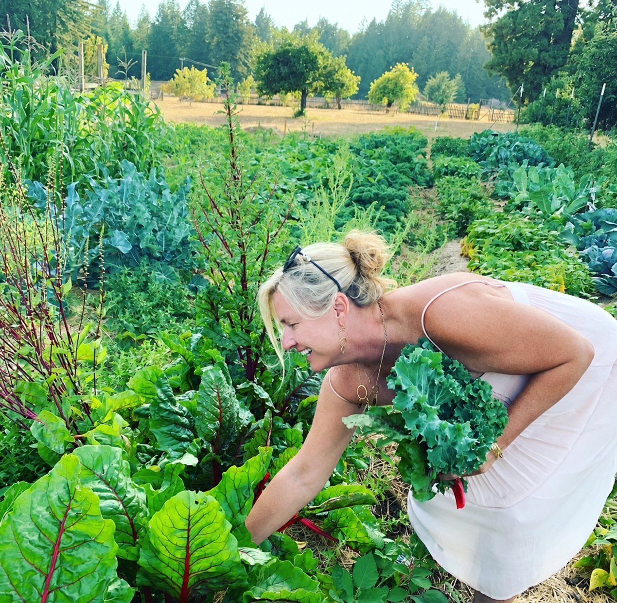 Mary Jo Landry in a garden at a friend's farm.